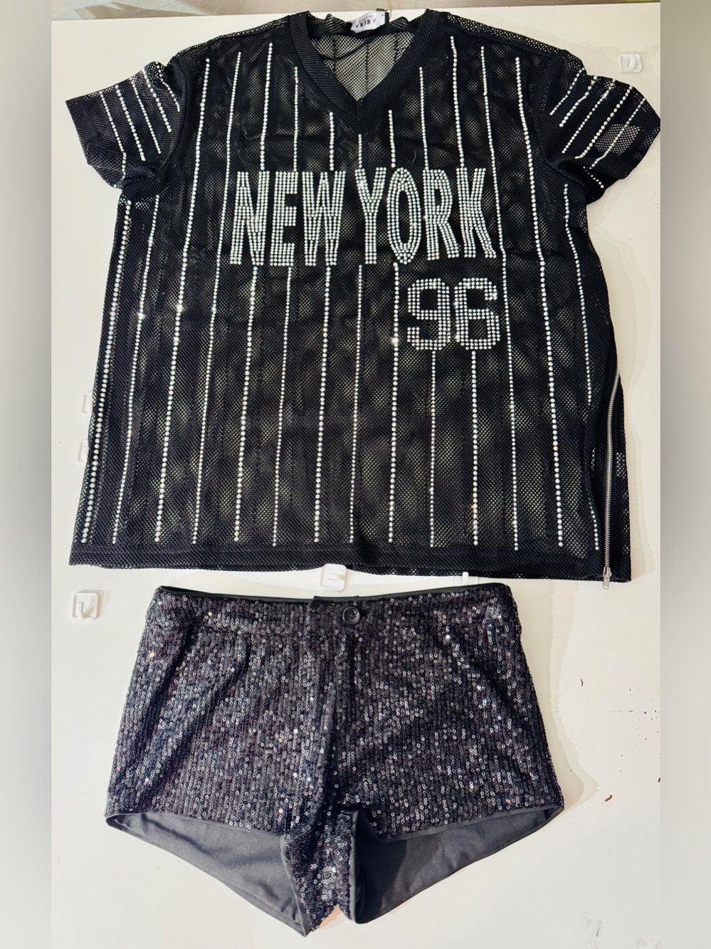 SHIMMERING 2 PIECE SET! THE TOP IS SHEAR. BOTH TOP AND SHORTS ARE FULL OF BLING!